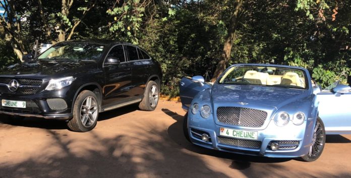 Cheunes black mercedes parked at Serena besides his Bentley